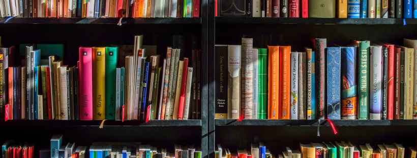 A book shelf in a library.